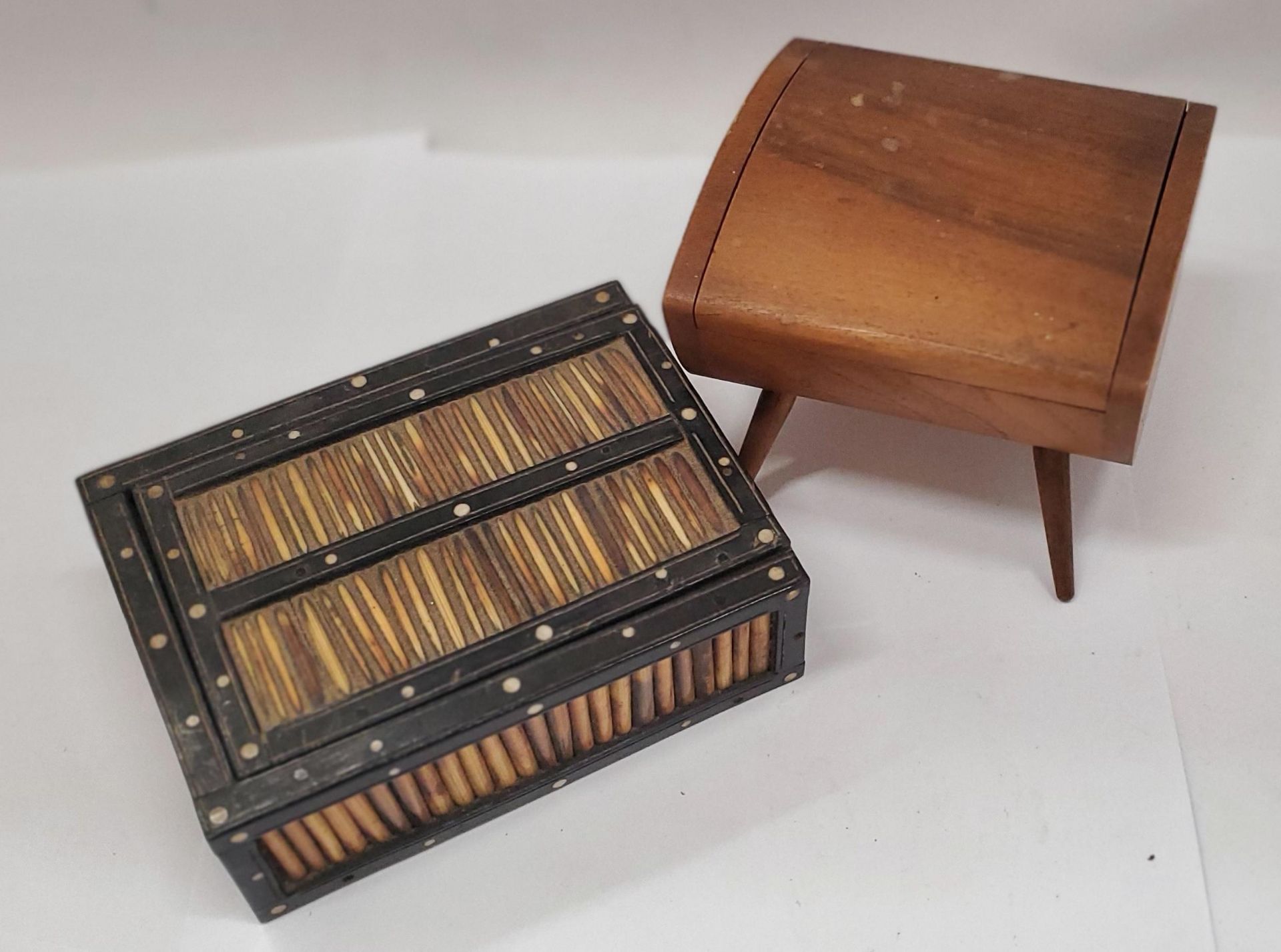 TWO VINTAGE BOXES, ONE WITH PORCUPINE QUILLS, THE OTHER ON LEGS
