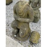 A LARGE RECONSTITUTED STONE BUDDHIST DIETY FIGURE A/F - HEIGHT (WITHOUT HEAD) 78 CM, DEPTH 42 CM
