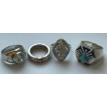 FOUR SILVER DRESS RINGS GROSS WEIGHT 38 GRAMS