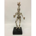 AN UNUSUAL WHITE METAL FIGURE ON BASE, SIGNED FEDERI CARLON?, NUMBERED 271/500