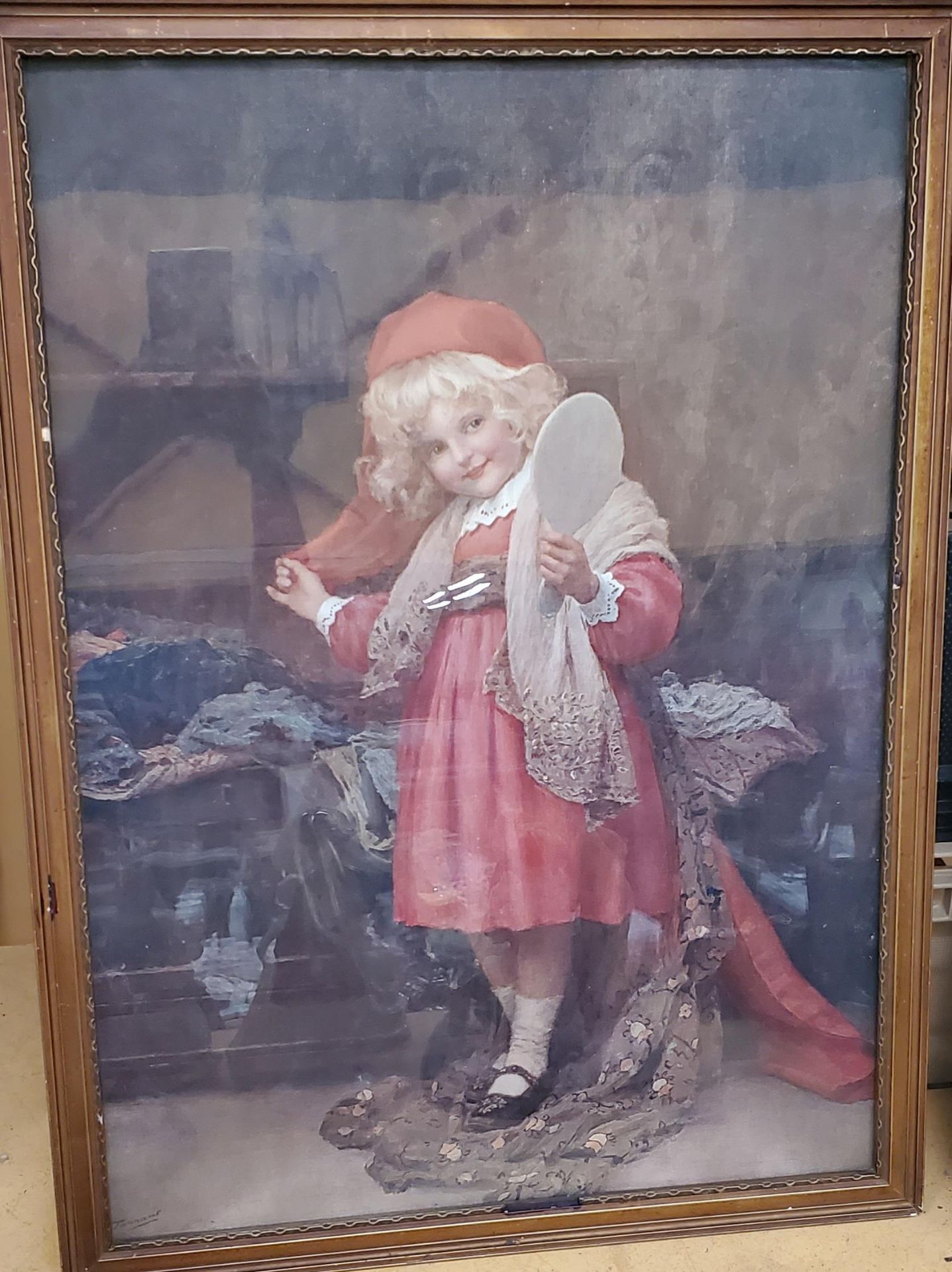 A PERCY TARRANT FRAMED EDWARDIAN PRINT OF A GIRL IN RED HOLDING A MIRROR