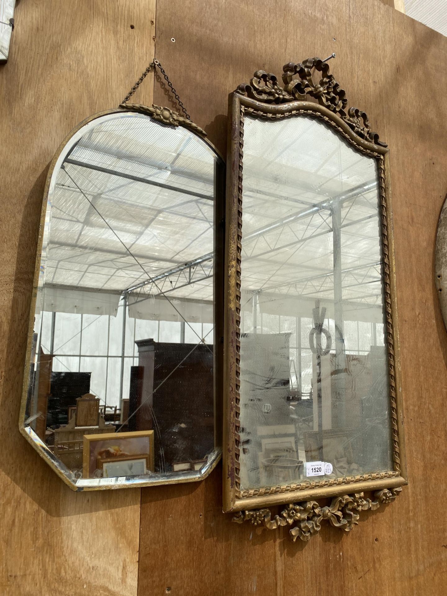 TWO VINTAGE MIRRORS TO INCLUDE AN EXAMPLE WITH DECORATIVE RIBBON DESIGN TOP