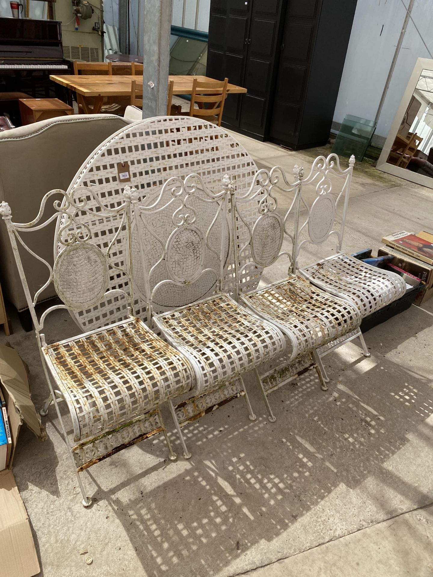 A SET OF FOUR METAL FOLDING GARDEN CHAIRS AND TABLE