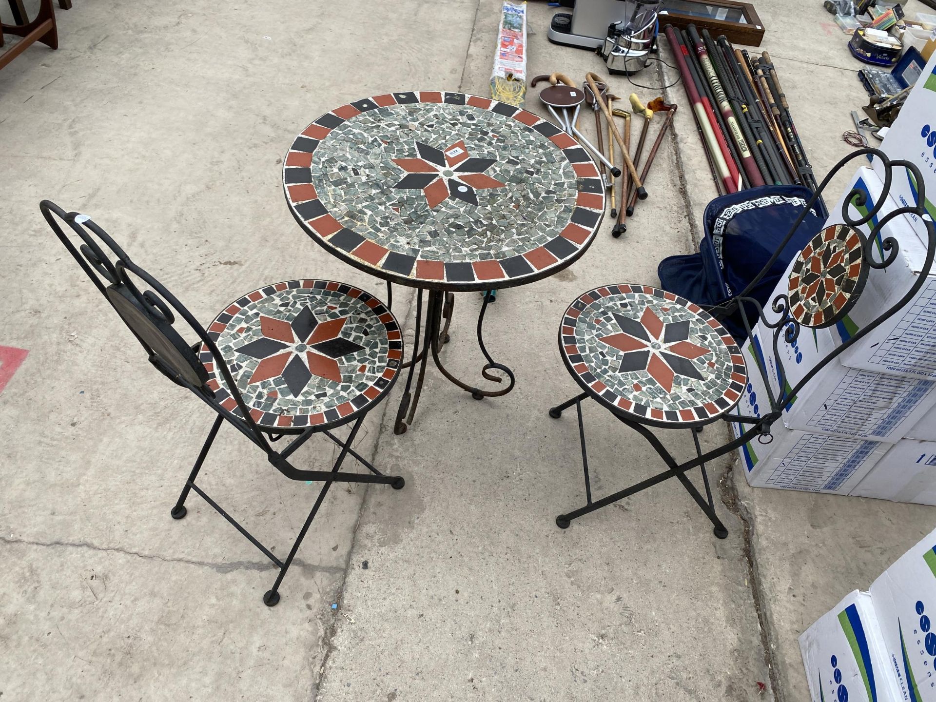 A THREE PIECE MOSAIC TILED BISTRO SET COMPRISING OF A TABLE AND TWO CHAIRS
