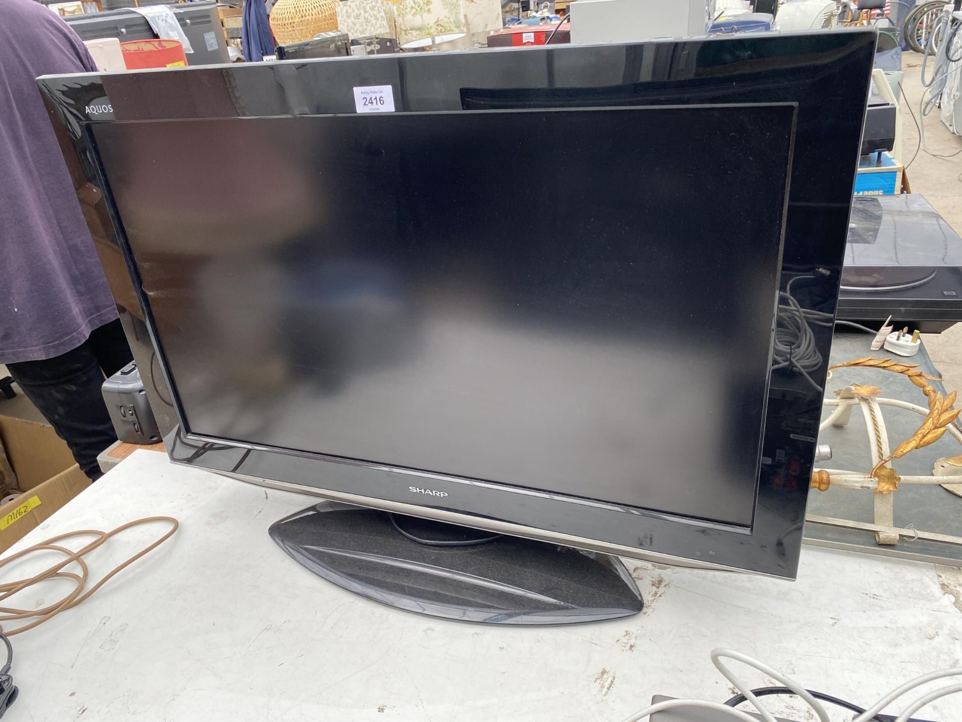 A 32" SHARP TELEVISION