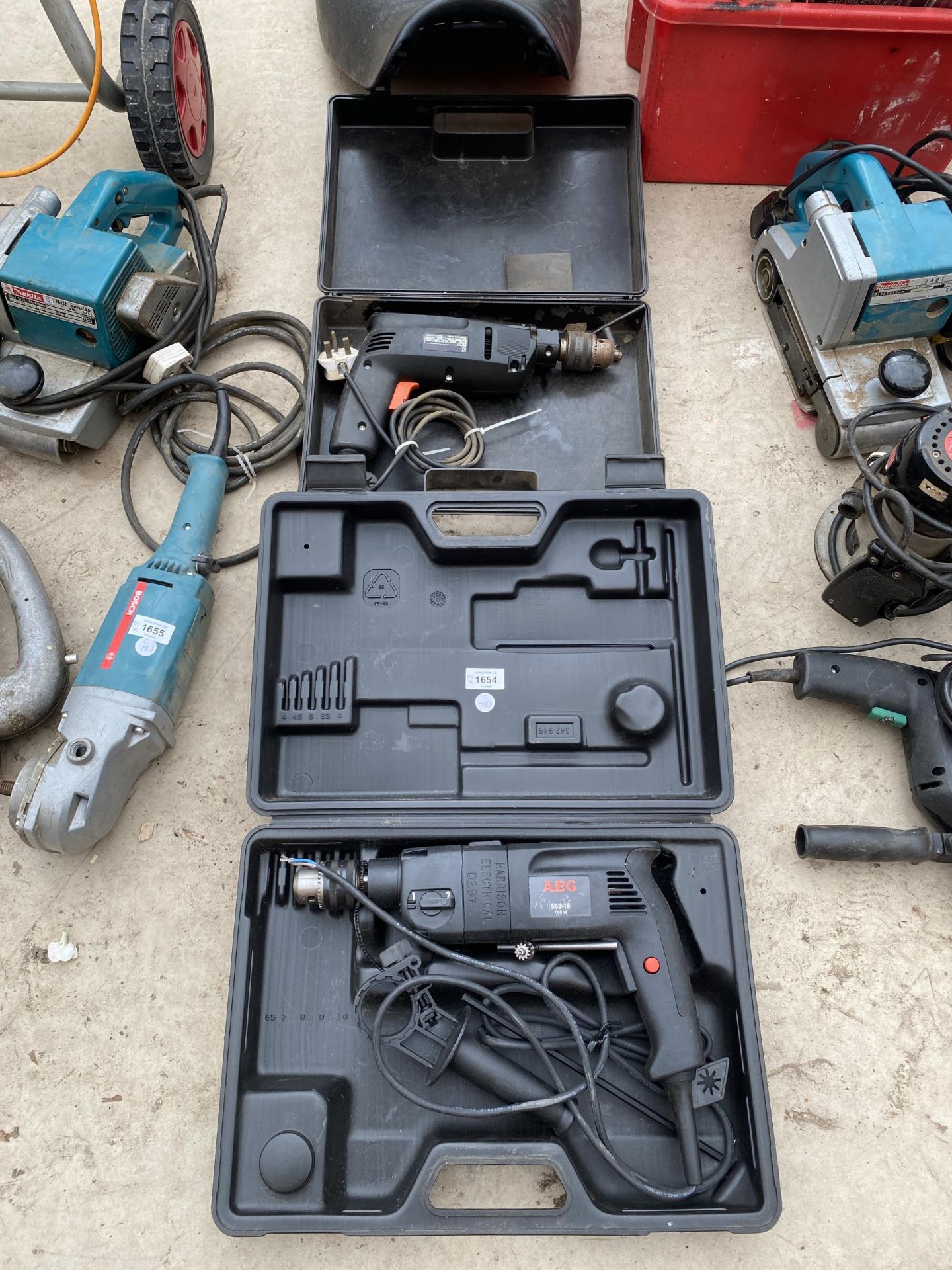 TWO CASED POWER TOOLS INCLUDING AEG DRILL