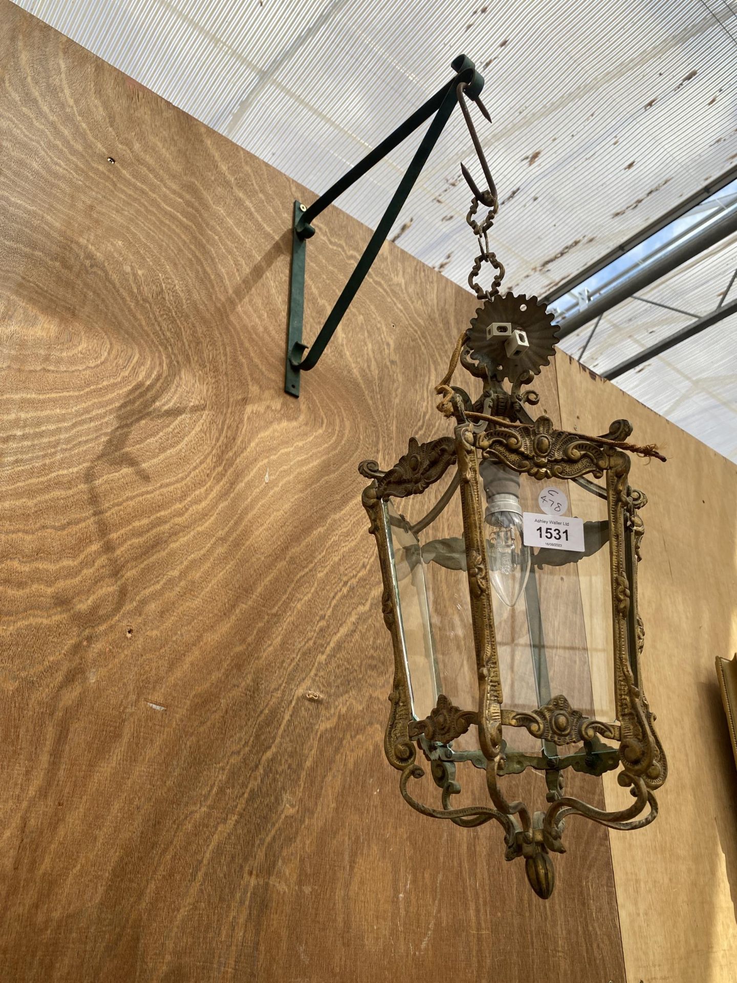 A VINTAGE GILT OUTDOOR HANGING LANTERN