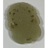 A CHINESE JADEITE JADE STYLE CARVED PENDANT PLAQUE, LENGTH 6CM