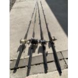 FOUR FISHING RODS AND REELS, SILSTAR X CUTTER, GAMEHUNTER ETC