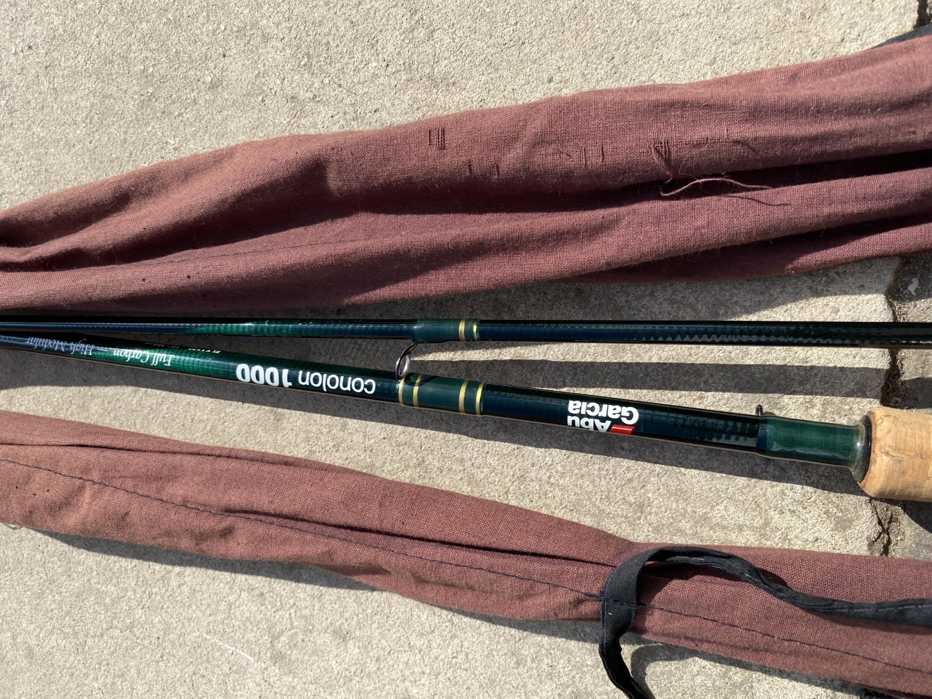 AN ABU GARCIA CONOLON 1000 FISHING ROD WITH CASE - Image 2 of 3