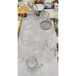 A QUANTITY OF GLASSWARE TO INCLUDE VASES, ROSE BOWLS, STORAGE JARS, DESSERT BOWLS, ETC