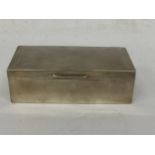 A BIRMINGHAM HALLMARKED SILVER CIGARETTE BOX