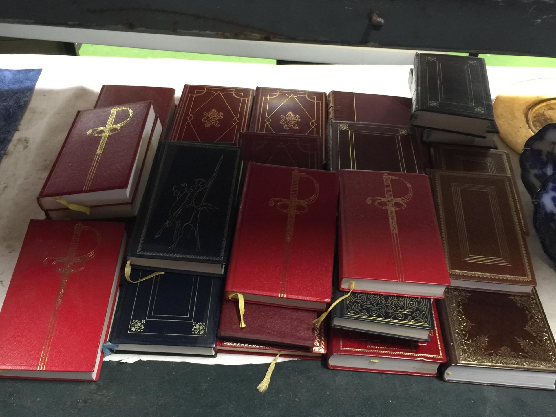 A COLLECTION OF GILT TOOLED BOOKS, DON QUIXOTE, SIR WALTER SCOTT NOVELS ETC