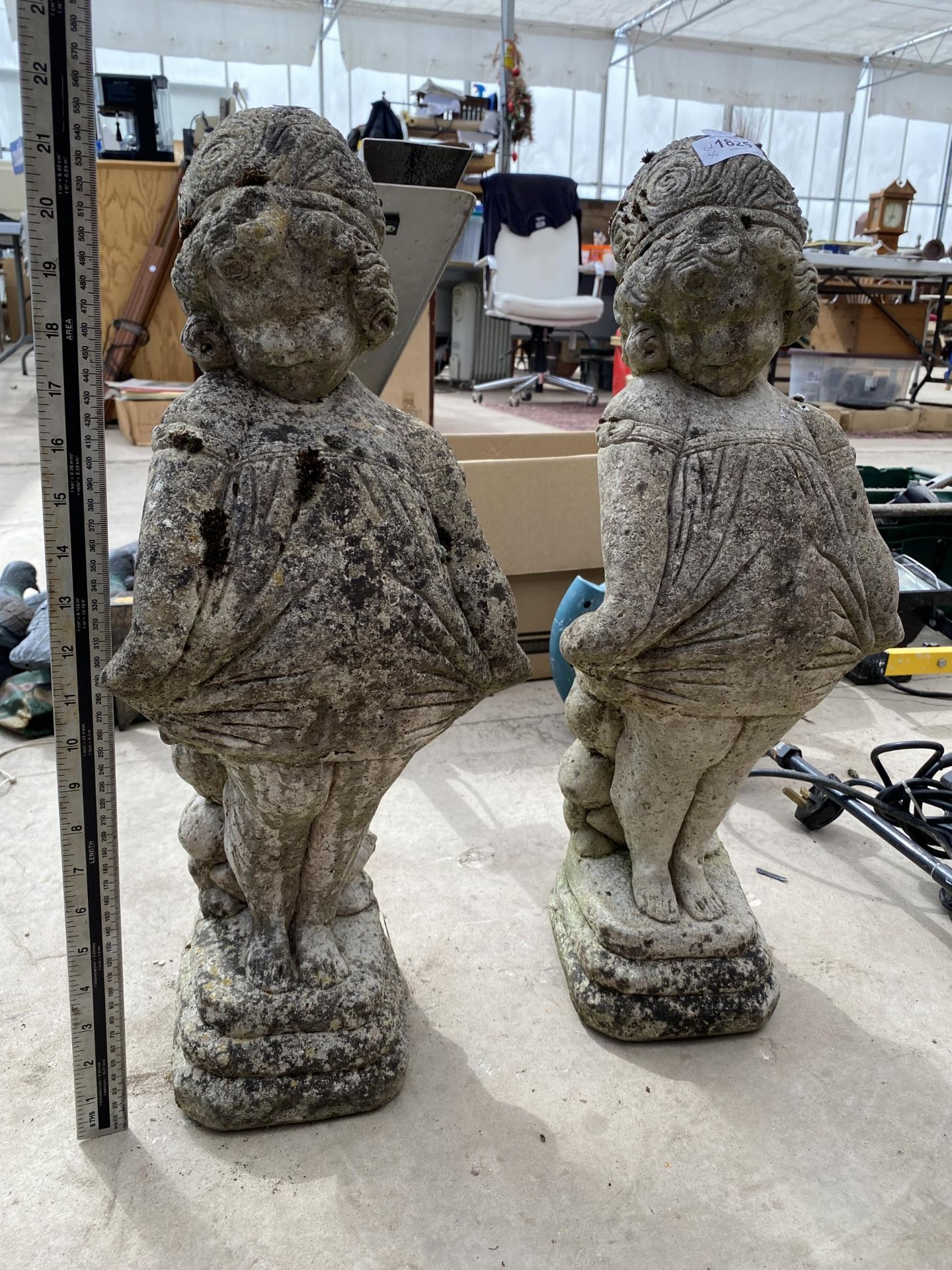 TWO VINTAGE GARDEN STONE STATUES OF GIRLS