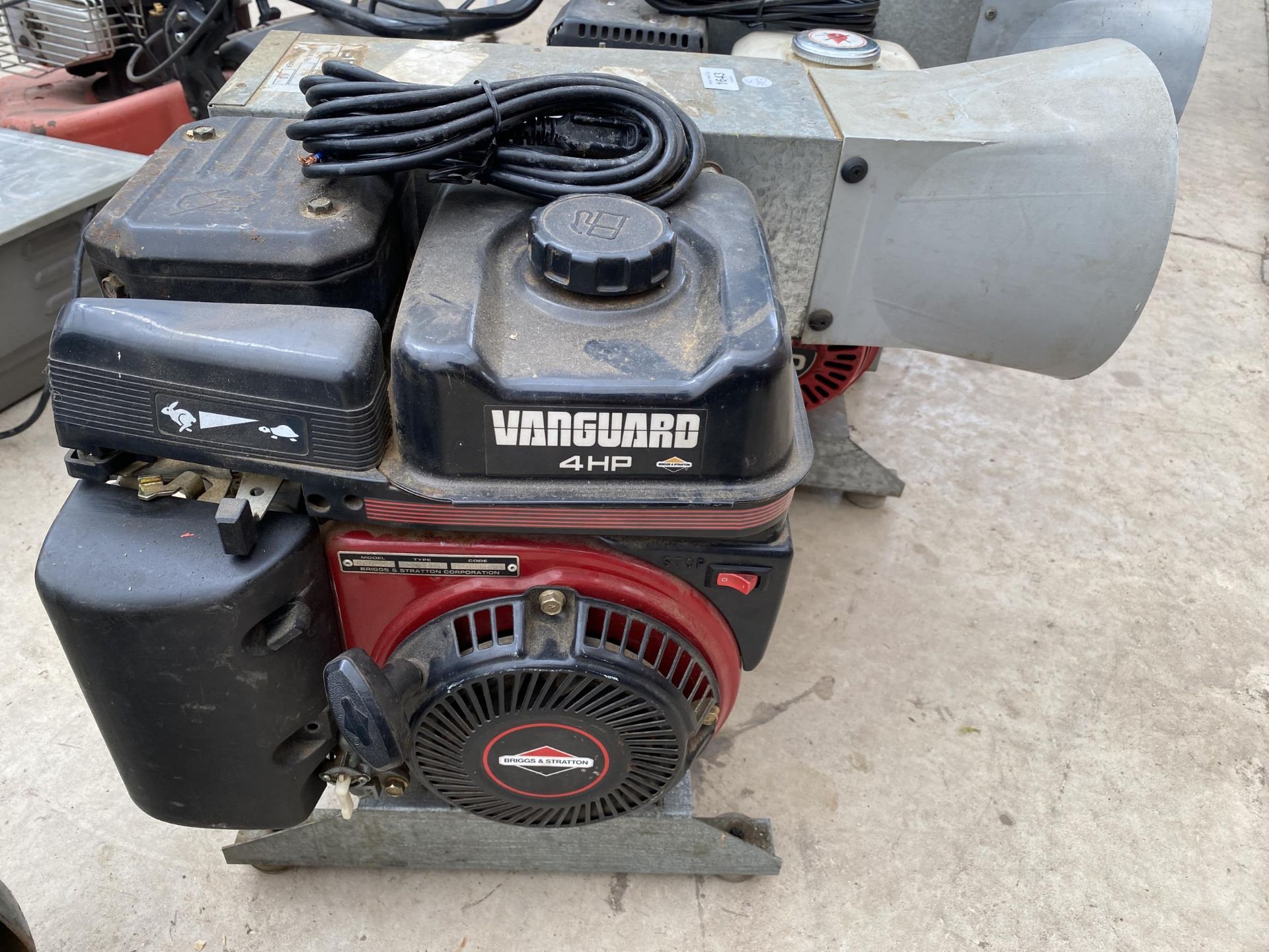 A COMPRESSOR / BLOWER WITH A VANGUARD 4HP BRIGGS AND STRATTON PETROL ENGINE