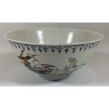 A CHINESE PORCELAIN BOWL WITH BIRD AND FLORAL DESIGN, QIANLONG SEAL MARK TO BASE, DIAMETER 12.5CM