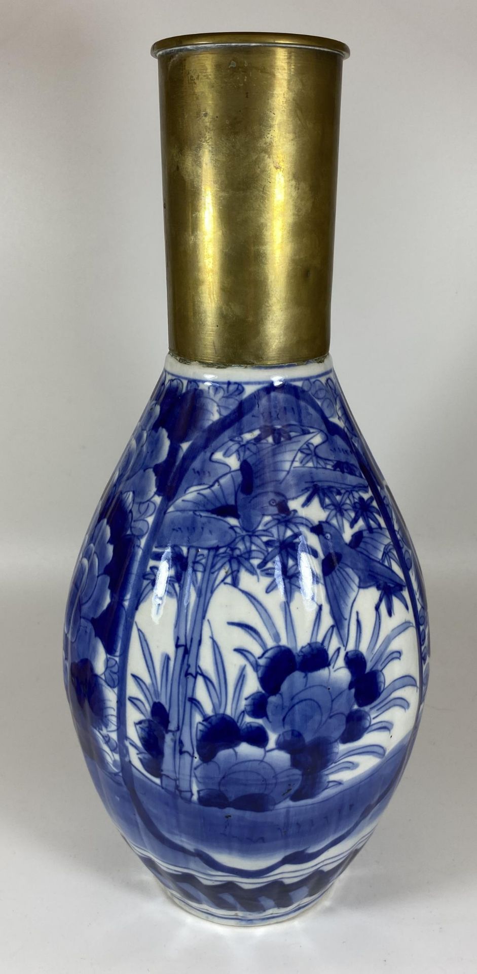 A LARGE JAPANESE MEIJI PERIOD (1868-1912) BLUE AND WHITE FLORAL DESIGN VASE WITH CONVERTED TRENCH