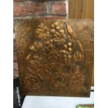 A VINTAGE FLORA COPPER EMBOSSED LARGE PLAQUE