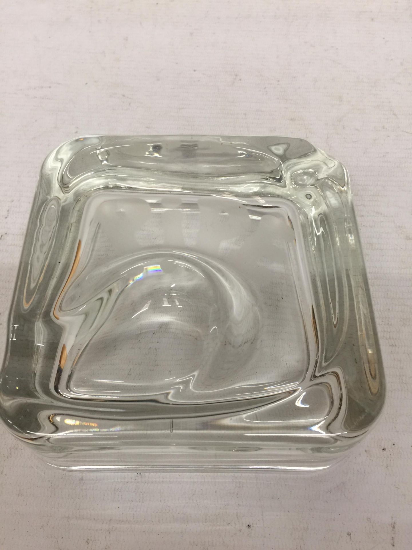 A GLASS PIPE REST AND ASHTRAY