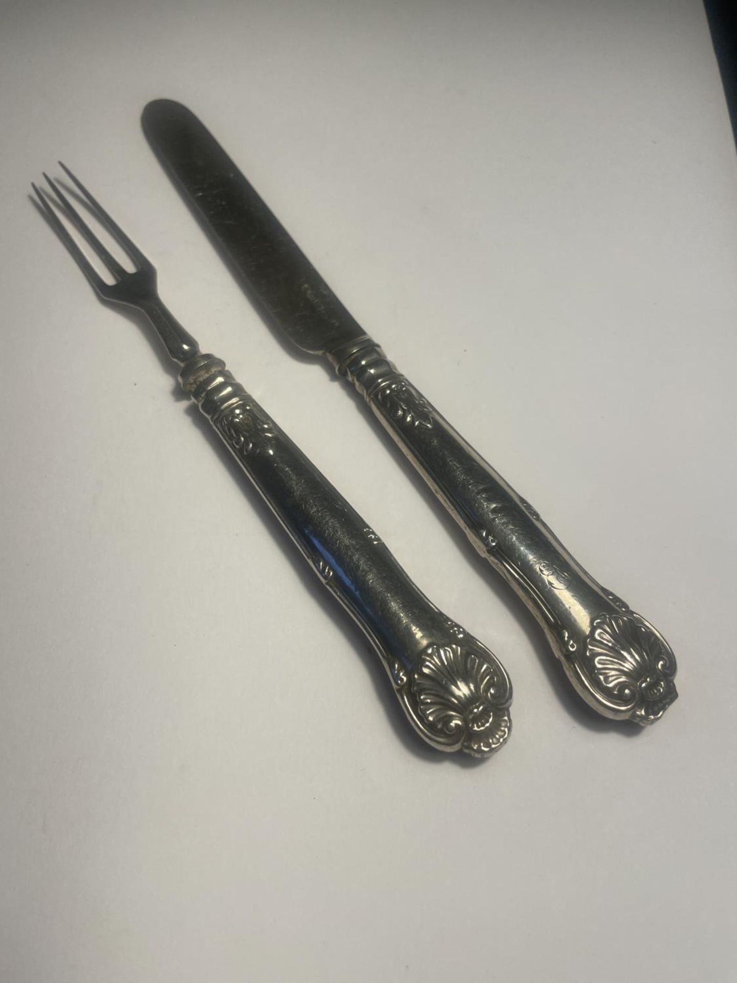 A MARKED SILVER KNIFE AND FORK