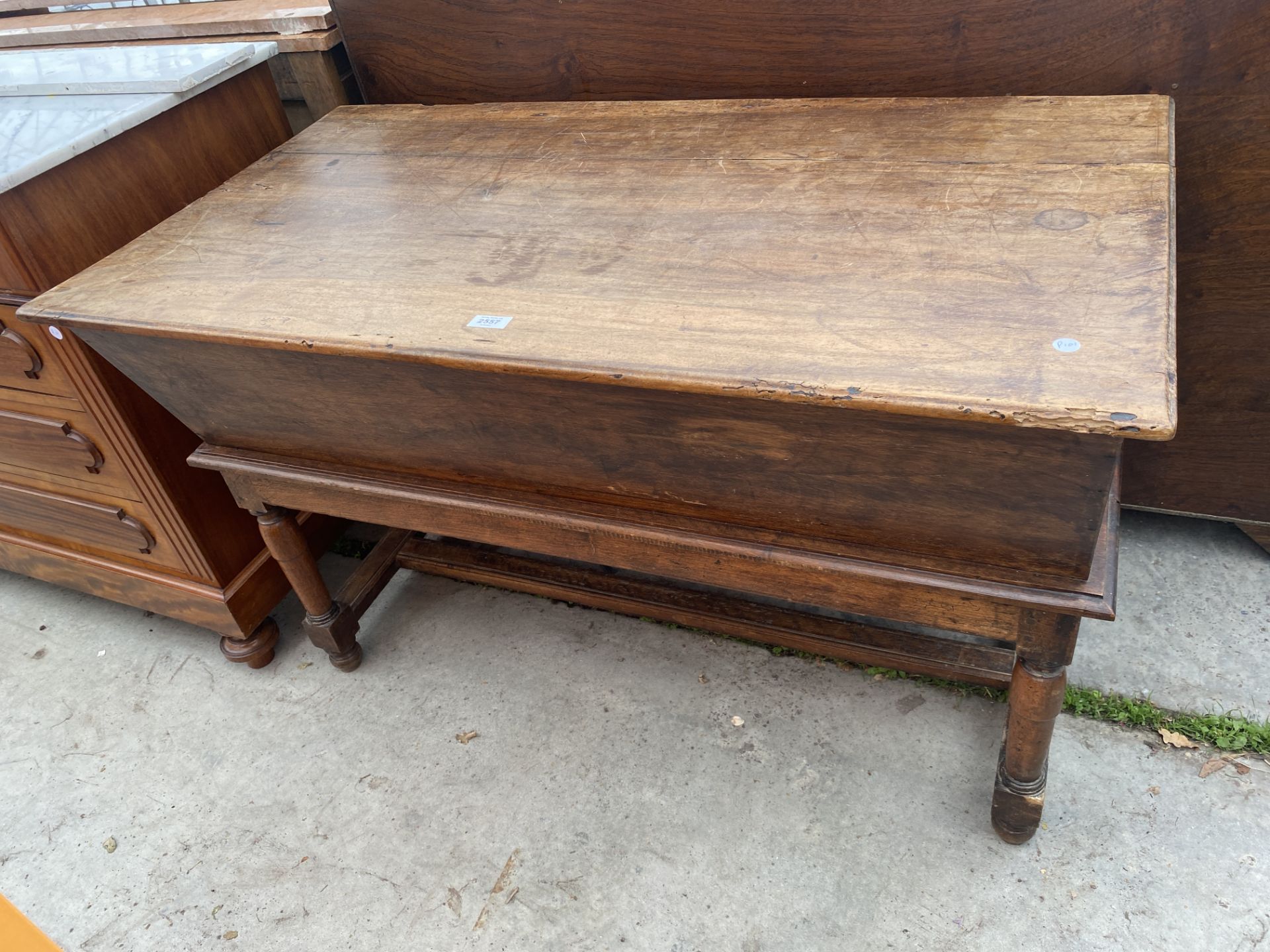 A CONTINENTAL VICTORIAN DOUGH BIN ON OPEN BASE WITH TURNED LEGS, 44X24"