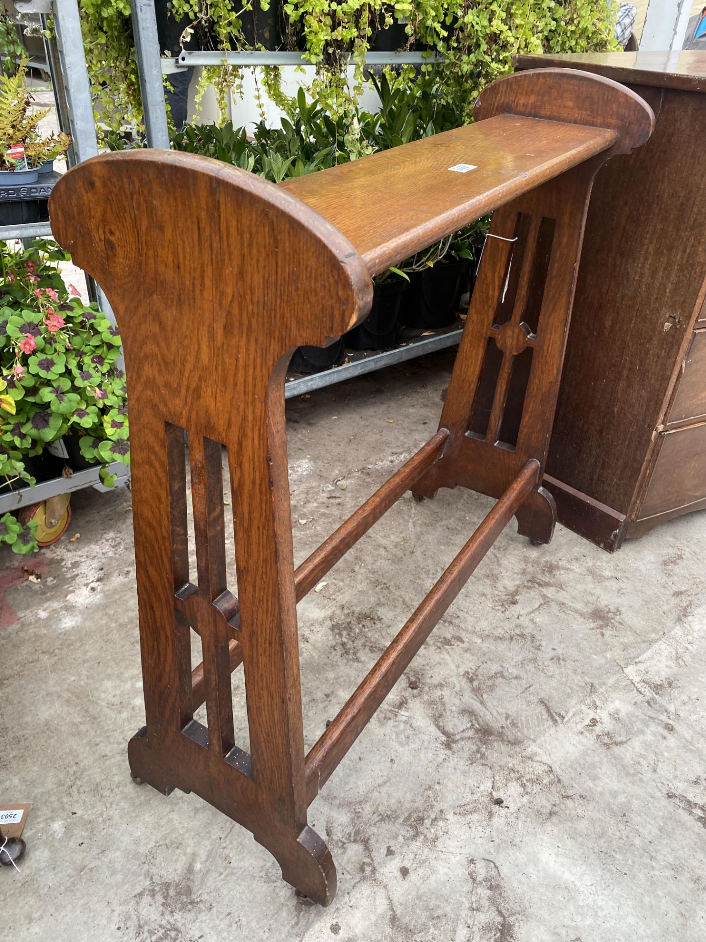 AN ARTS & CRAFTS BOOT STAND WITH UPPER SHELF ON CASTERS, 36" WIDE - Image 2 of 3