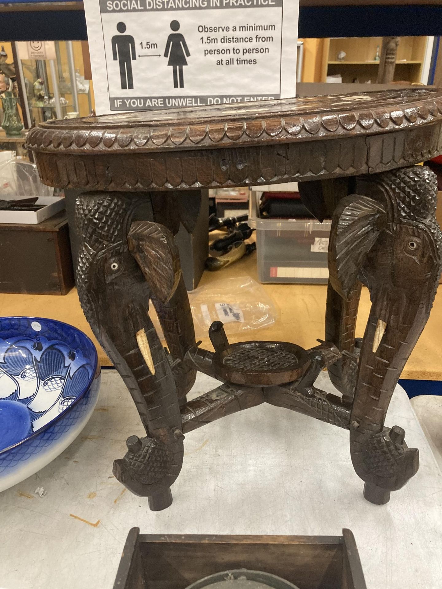 AN ORIENTAL CARVED HARDWOOD TABLE WITH ELEPHANT DESIGN LEGS - Image 3 of 5