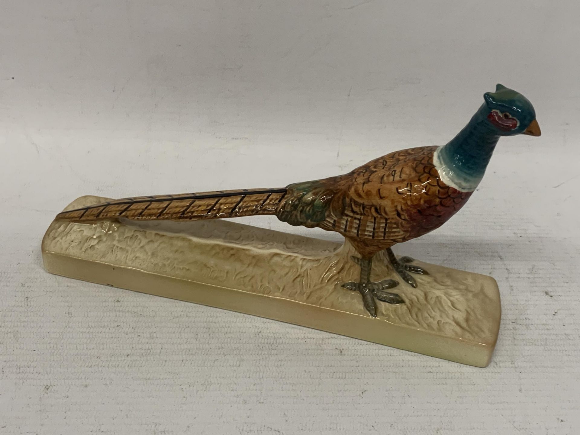 A BESWICK NO. 1774 PHEASANT ON BASE