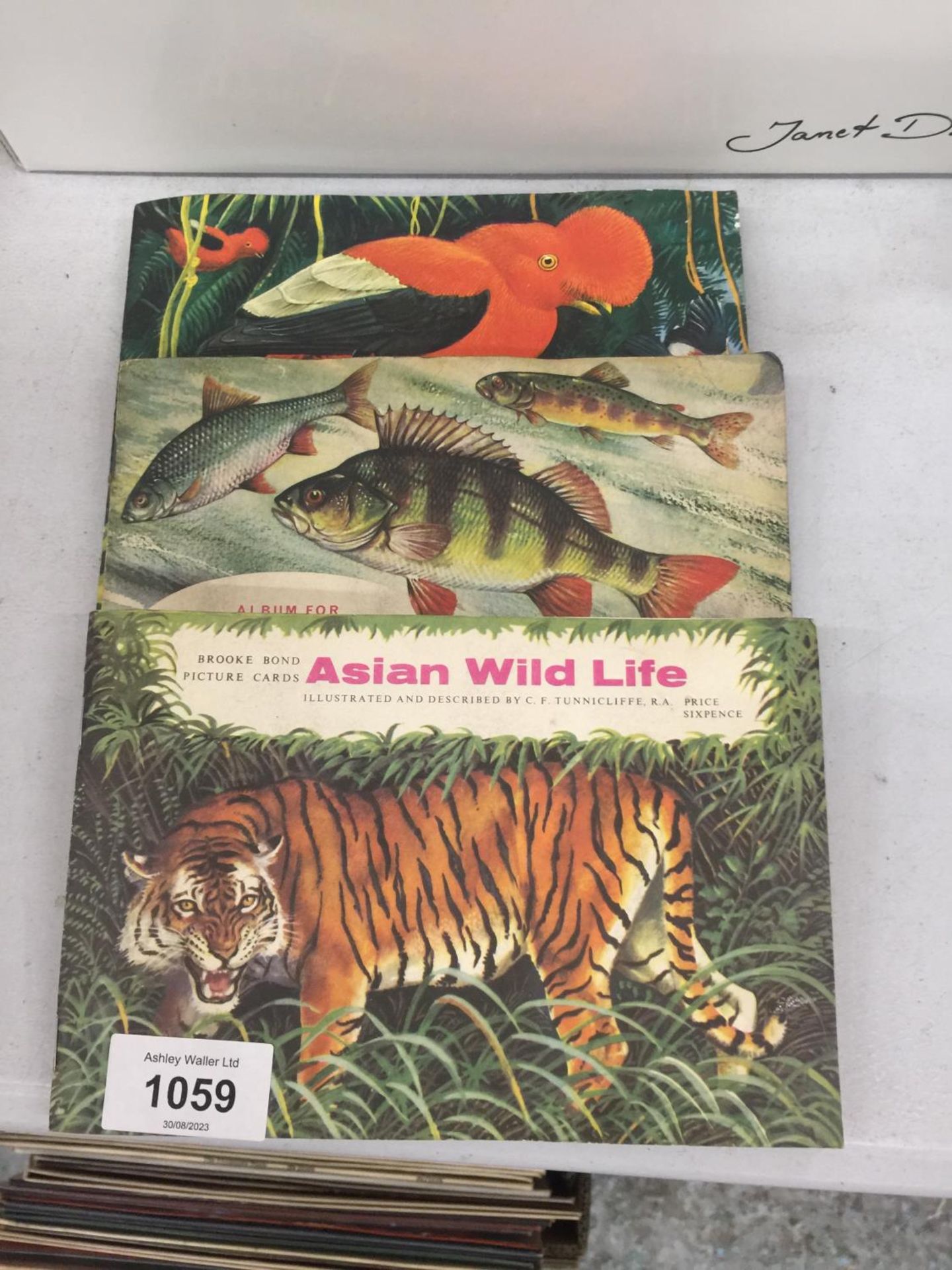 THREE VINTAGE BROOK BOND TEA PICTURE CARD ALBUMS WITH CARDS TO INCLUDE FRESHWATER FISH, ASIAN WILD