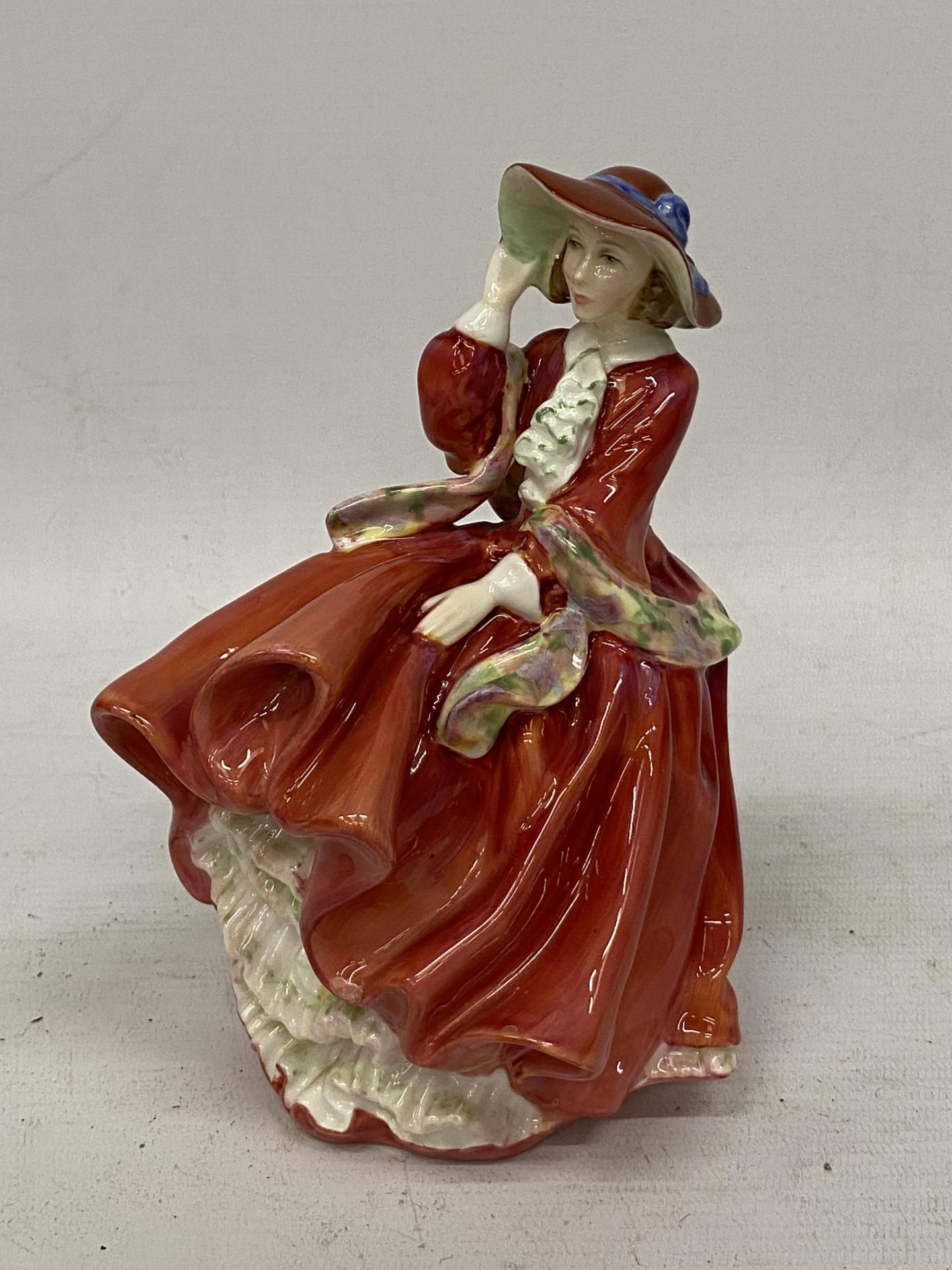 A ROYAL DOULTON 'TOP O' THE HILL' HN1834 LADY FIGURE