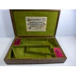 AN OAK BOX WITH FITTED INTERIOR TO TAKE A PAIR OF REVOLVERS/PISTOLS, HAMMER TO END OF BARREL 30CM,
