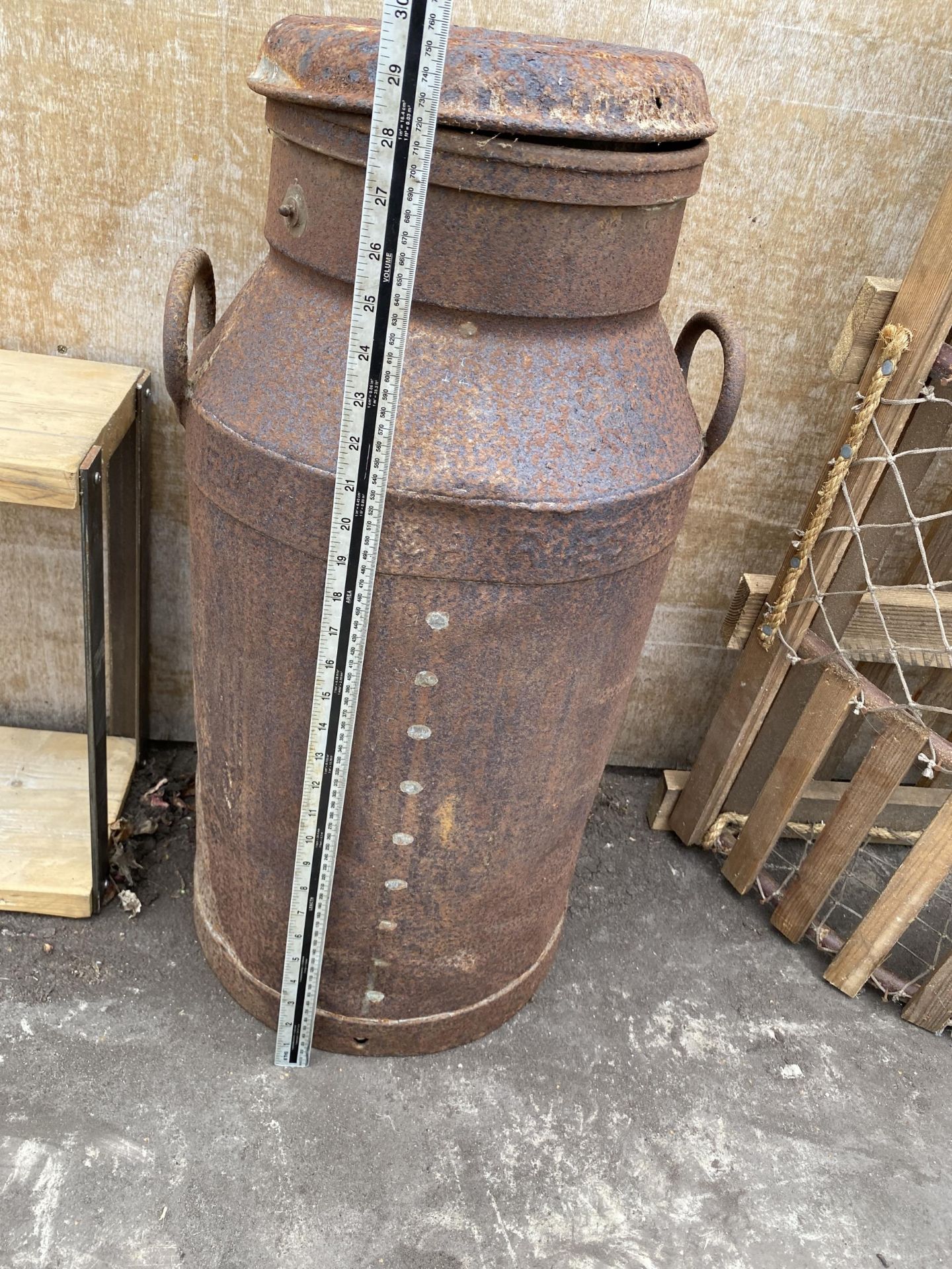 A VINTAGE MILK CHURN WITH LID BEARING AN INDISTINCT NAME - Image 2 of 2