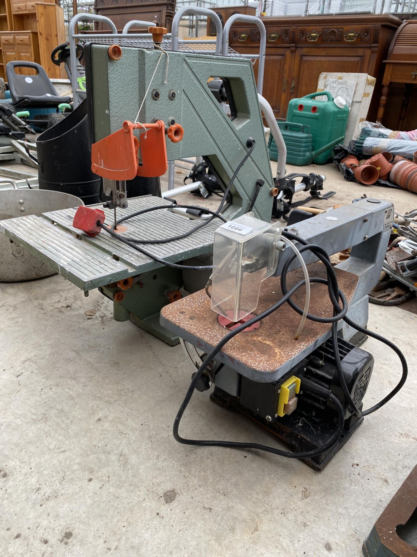 AN ELECTRIC DEWALT BAND SAW AND A FURTHER ELECTRIC SCROLL SAW