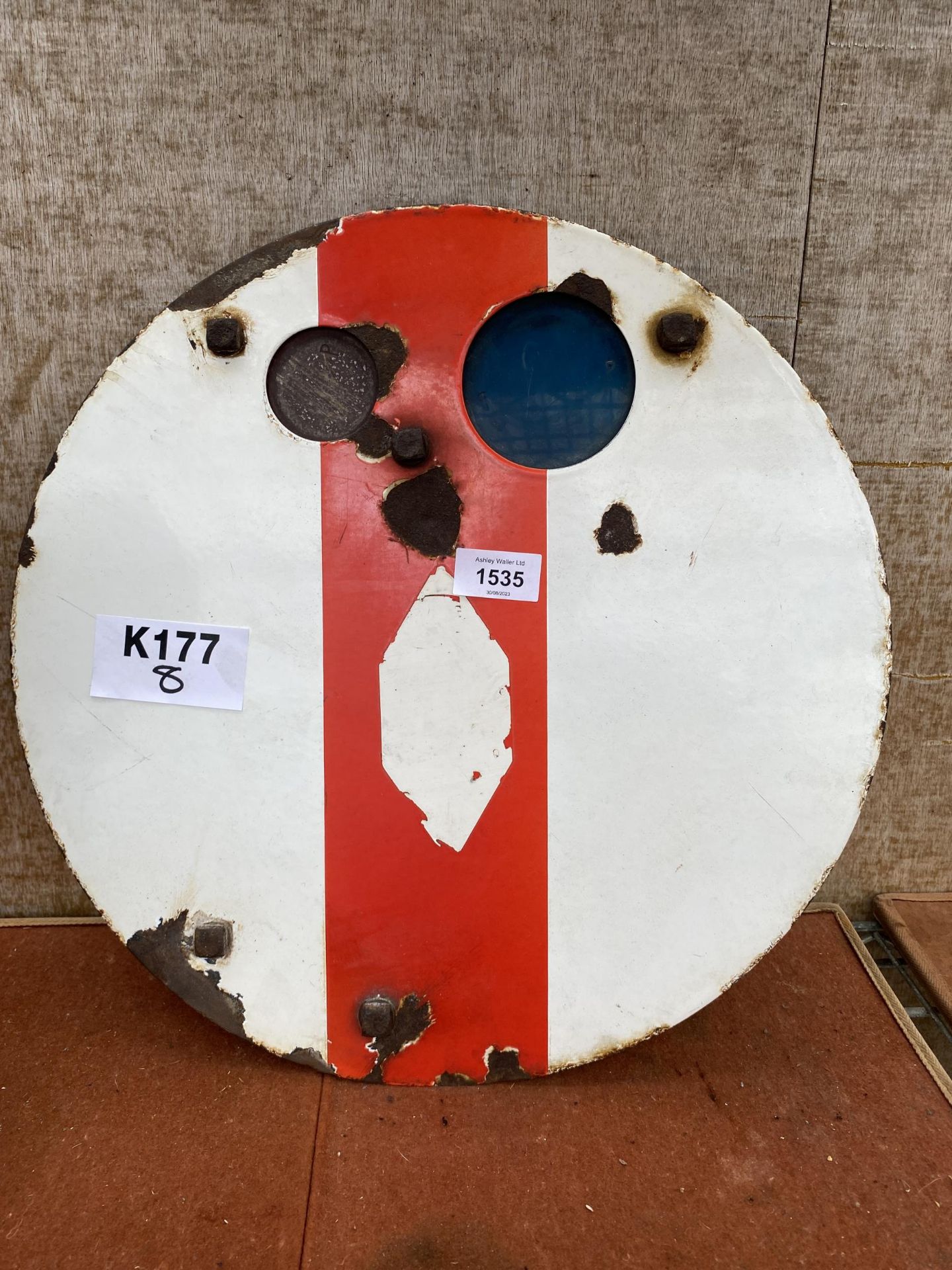 A VINTAGE CIRCULAR RAILWAY SIGNAL SIGN