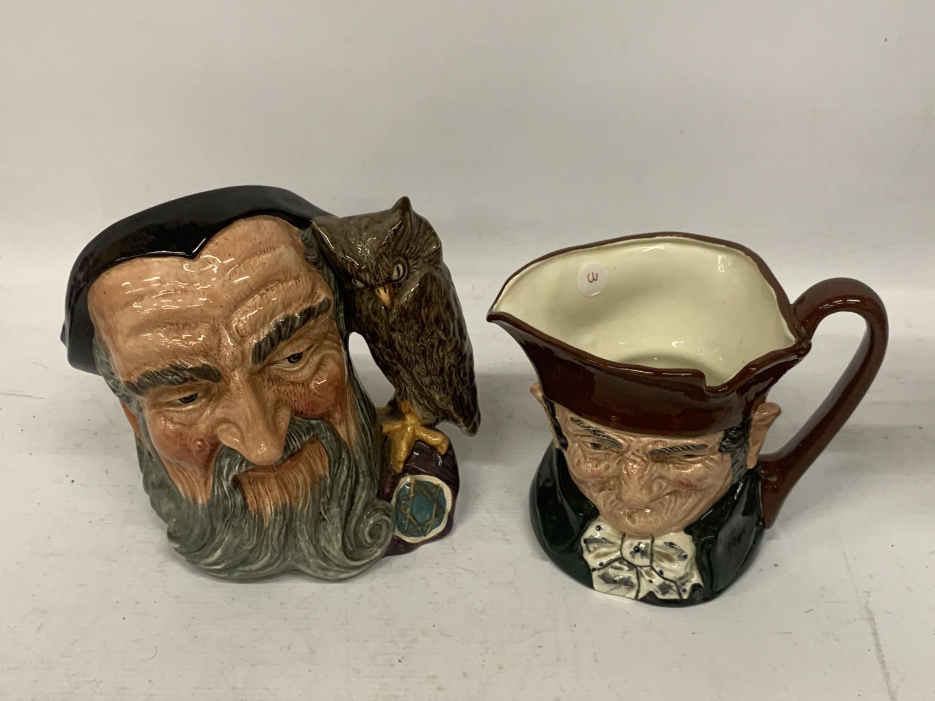 TWO ROYAL DOULTON CHARACTER JUGS - 'MERLIN' (SECONDS) & 'OLD CHARLEY'