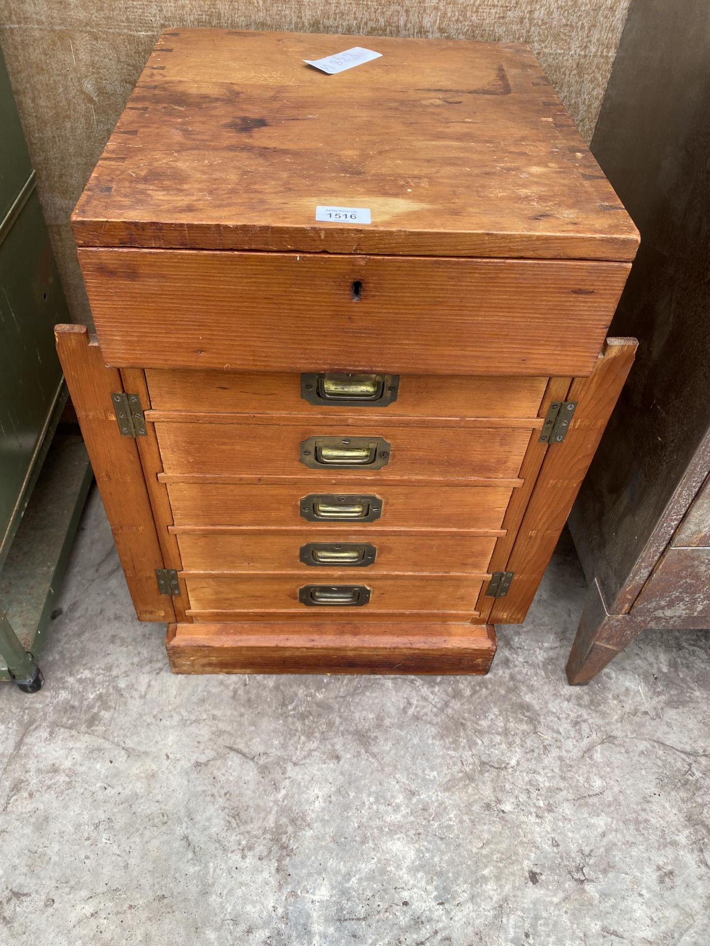 A VINTAGE PINE SIX DRAWER HABERDASHERY CABINET