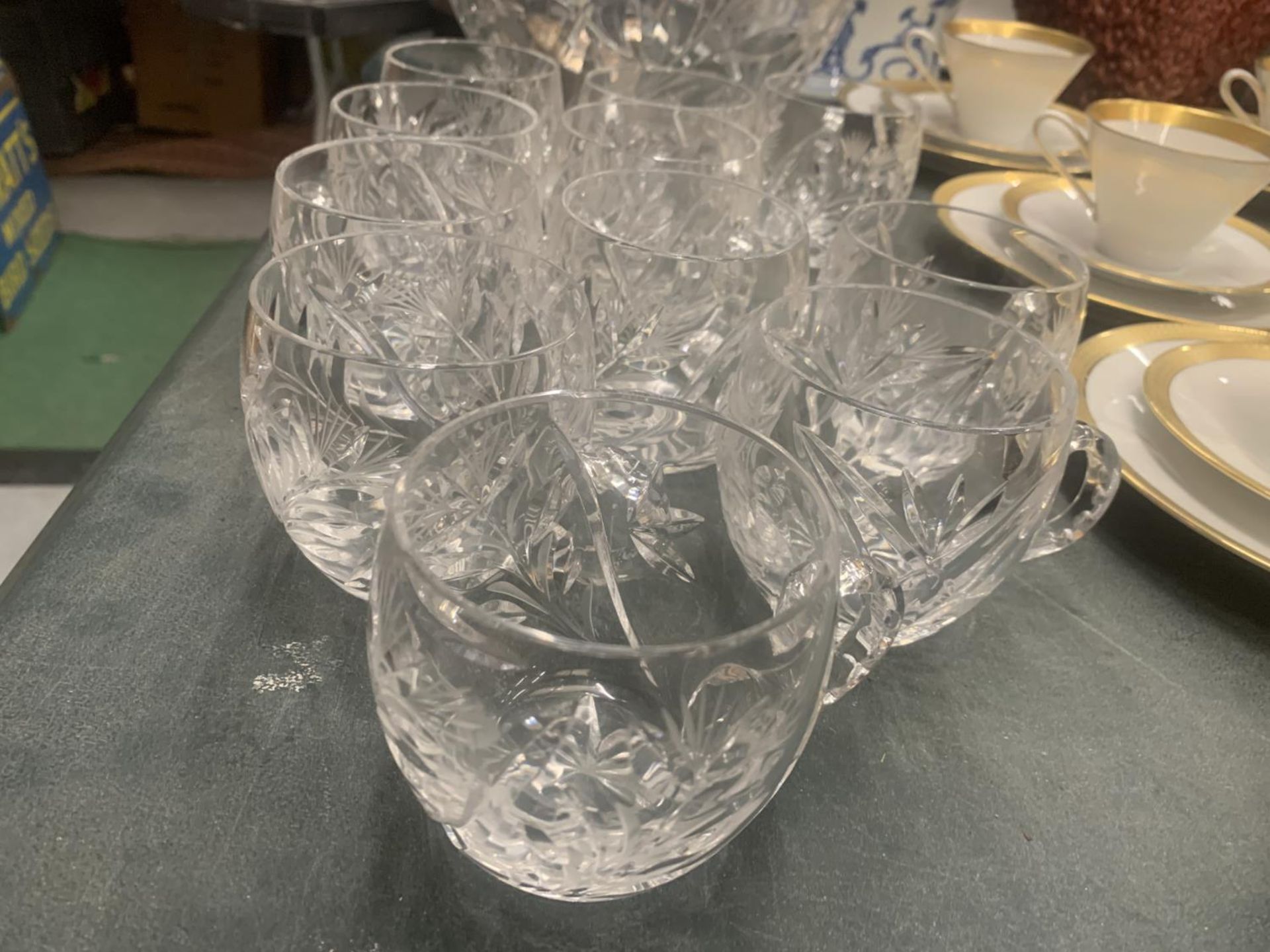 A HEAVY CUT GLASS PUNCH BOWL WITH LID, PUNCH GLASSES AND A STAMPED WMF SILVER PLATED LADEL WITH - Image 3 of 3