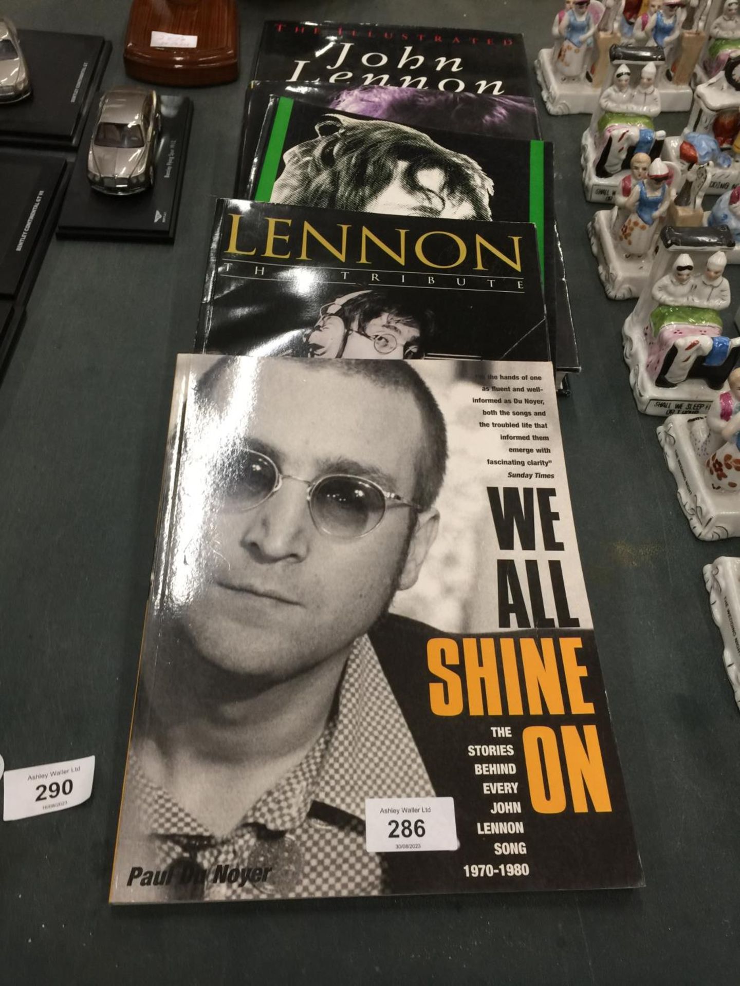 FIVE JOHN LENNON BOOKS TO INCLUDE "WE SHALL SIGN ON" "THE TRIBUTE", ETC