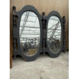 A VINTAGE WOODEN DOUBLE OVAL WALL MIRROR
