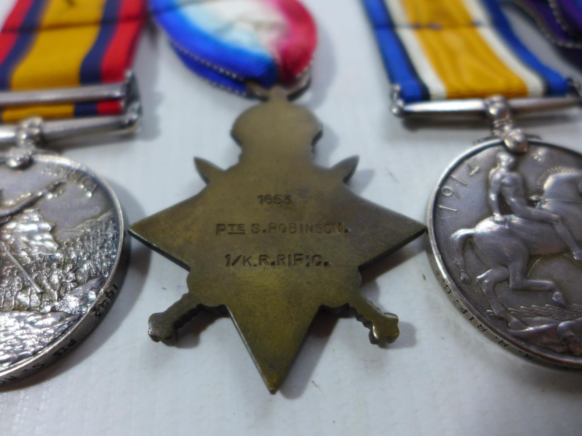 A BOER WAR AND WORLD WAR I CASUALTY MEDAL GROUP AWARDED TO 1653 PRIVATE SIMEON ROBINSON OF THE KINGS - Image 4 of 5