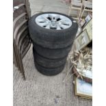 A SET OF FOUR BMW RIMS WITH 225/50 R17 TYRES