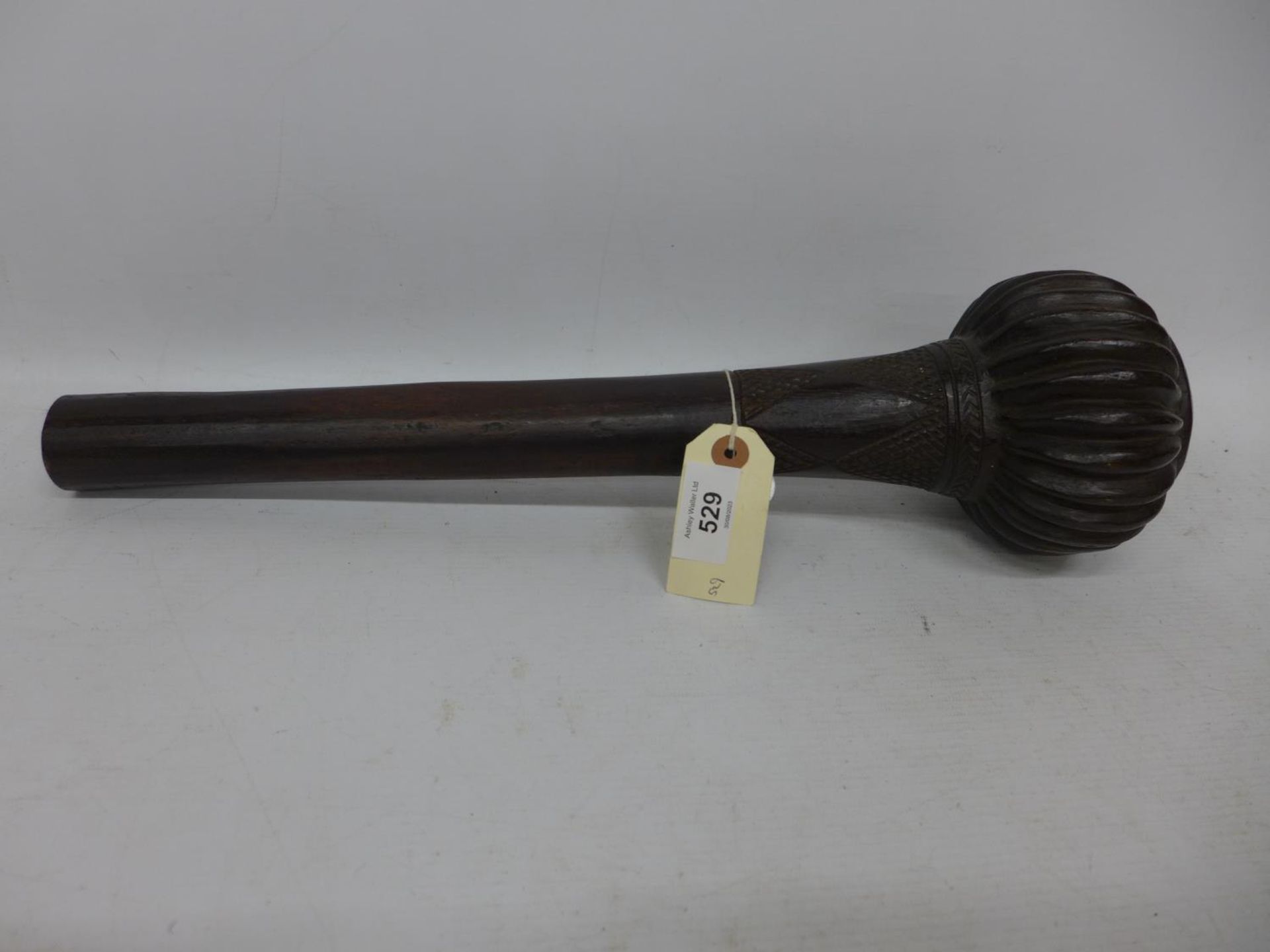 A FIJIAN ULA HARDWOOD THROWING CLUB, WITH CHIP CARVED DECORATION, LENGTH 49CM