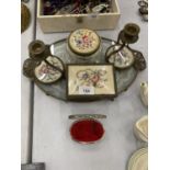 A PETIT POINT DRESSING TABLE SET TO INCLUDE A TRAY, CANDLESTICKS AND TRINKET BOXES