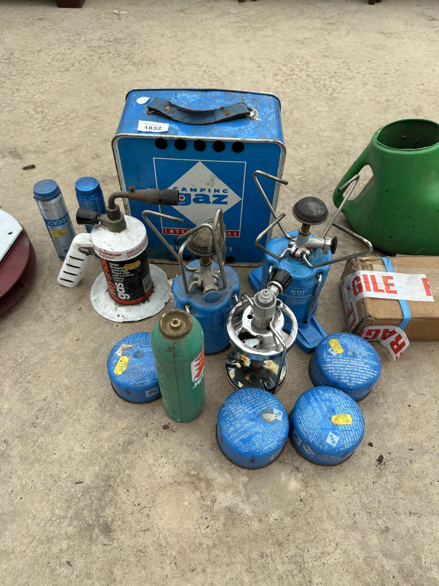 AN ASSORTMENT OF CAMPING STOVES AND GAS ETC