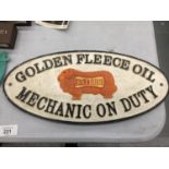 A CAST METAL SIGN GOLDEN FLEECE OIL MECHANIC ON DUTY