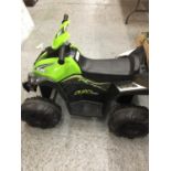 A CHILDREN'S ELECTRIC QUAD BIKE WITH CHARGER - VENDOR STATES IN WORKING ORDER AND VERY LITTLE USE,