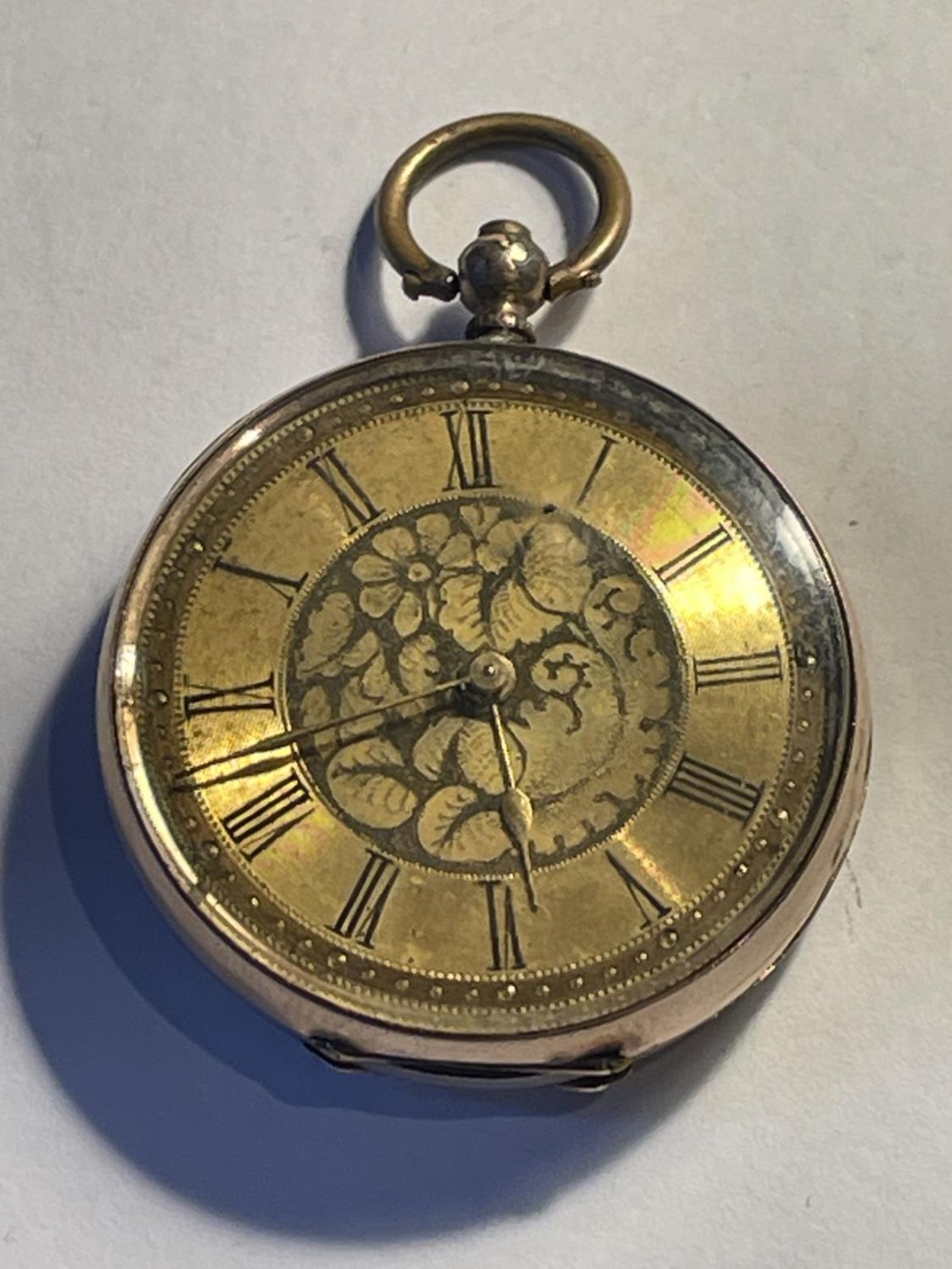 A 9CT GOLD LADIES OPEN FACED POCKET WATCH GROSS WEIGHT 30.63 GRAMS