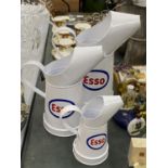 THREE GRADUATED 'ESSO' OIL CANS, HEIGHTS 29CM, 25CM AND 17CM