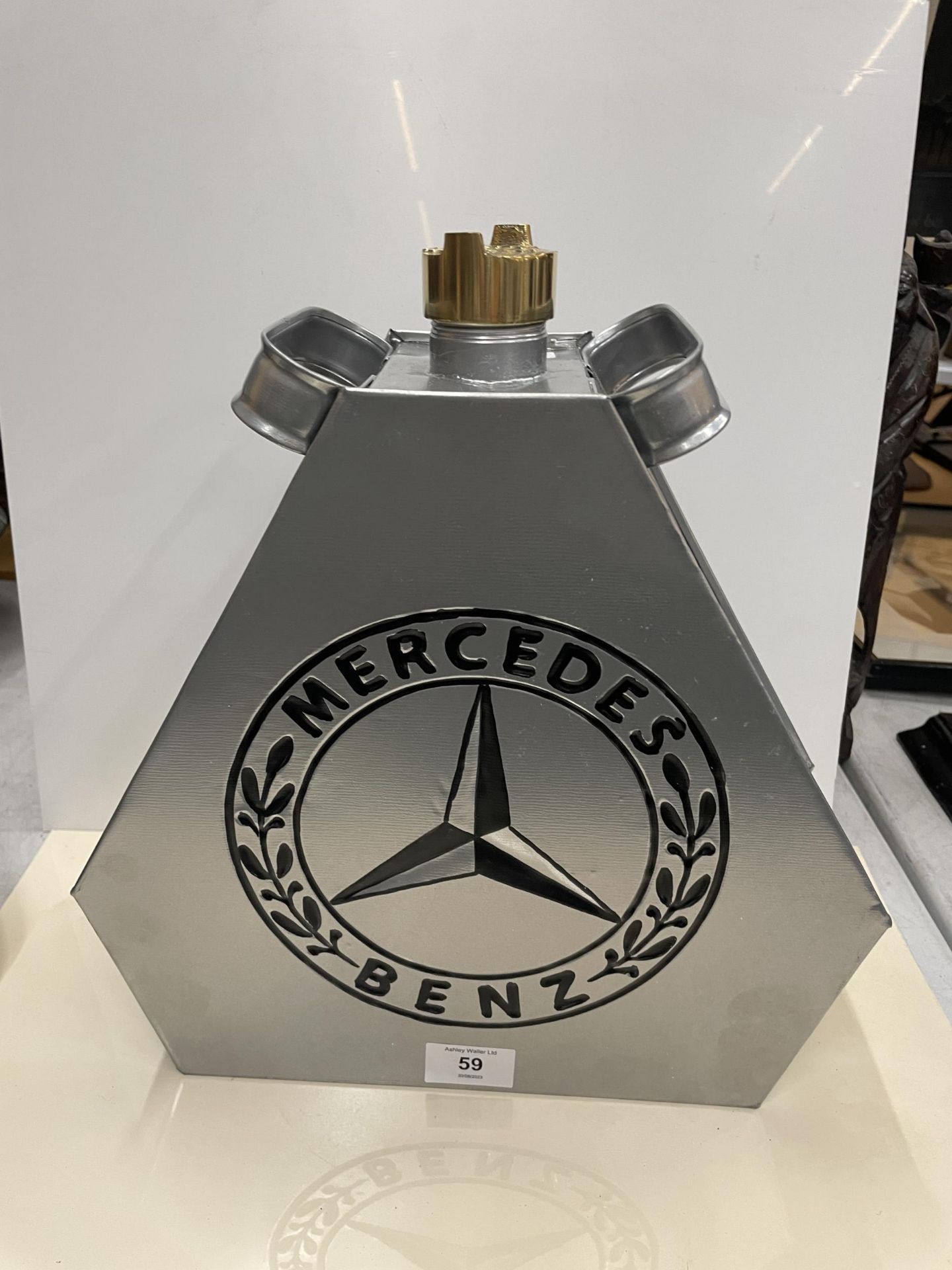 A SILVER MERCEDES PETROL CAN WITH BRASS TOP