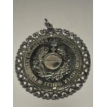 AN ELIZABETH II SILVER JUBILEE MEDALLION